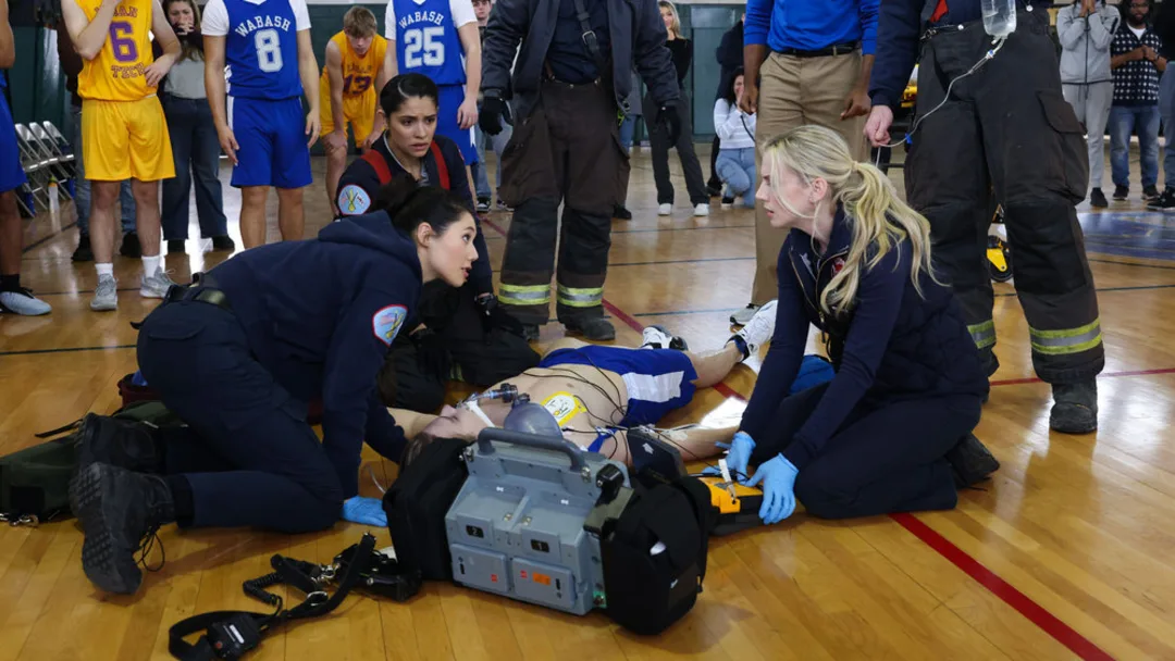 CHICAGO FIRE -- "On The Hook" Episode 12005 -- Pictured: (l-r) Hanako Greensmith as Violet Mikami, Miranda Rae Mayo as Stella Kidd, Christian Stolte as Randy "Mouch" McHolland, Kara Killmer as Sylvie Brett -- (Photo by: Adrian S Burrows Sr/NBC) /