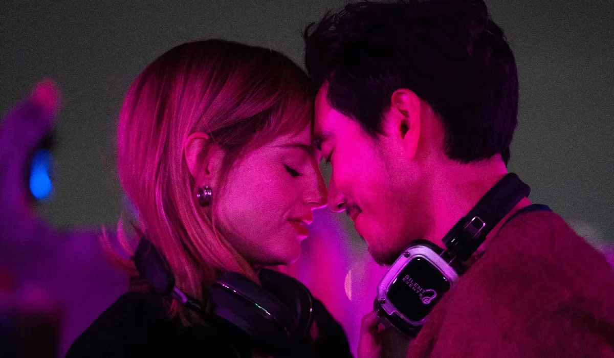 the greatest hits a melodic journey through time on star the greatest hits movie with lucy boynton and justin h min pressing their heads together in a heart