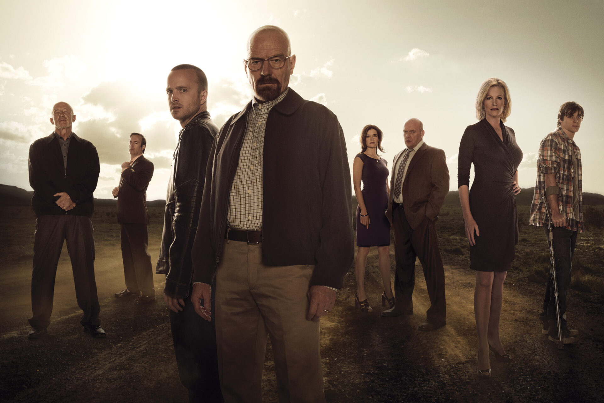 How Breaking Bad’s Iconic Scenes changed Pop Culture forever 14 (L-R) Mike (Jonathan Banks), Saul Goodman (Bob Odenkirk), Jesse Pinkman (Aaron Paul), Walter White (Bryan Cranston), Marie Schrader (Betsy Brandt), Hank Schrader (Dean Norris), Skyler White (Anna Gunn) and Walter White, Jr. (RJ Mitte) - Breaking Bad _Season 5 - Photo Credit: Frank Ockenfels/AMC