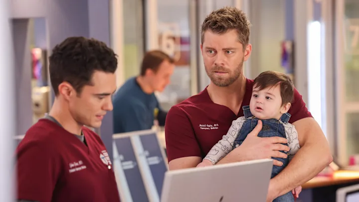 Chicago Med Season 10 Finale Teases End of Asher-Ripley-Archer Drama 20 CHICAGO MED -- "Baby Mine..." Episode 1021 -- Pictured: (l-r) Darren Barnet as Dr. John Frost, Luke Mitchell as Dr. Mitch Ripley, Connor Esterson as Noah Macron -- (Photo by: George Burns Jr/NBC)
