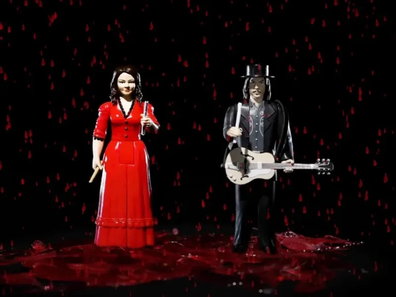the white stripes celebrate 20 years of get behind me satan with action figures and a surreal video red rain the white stripes mus