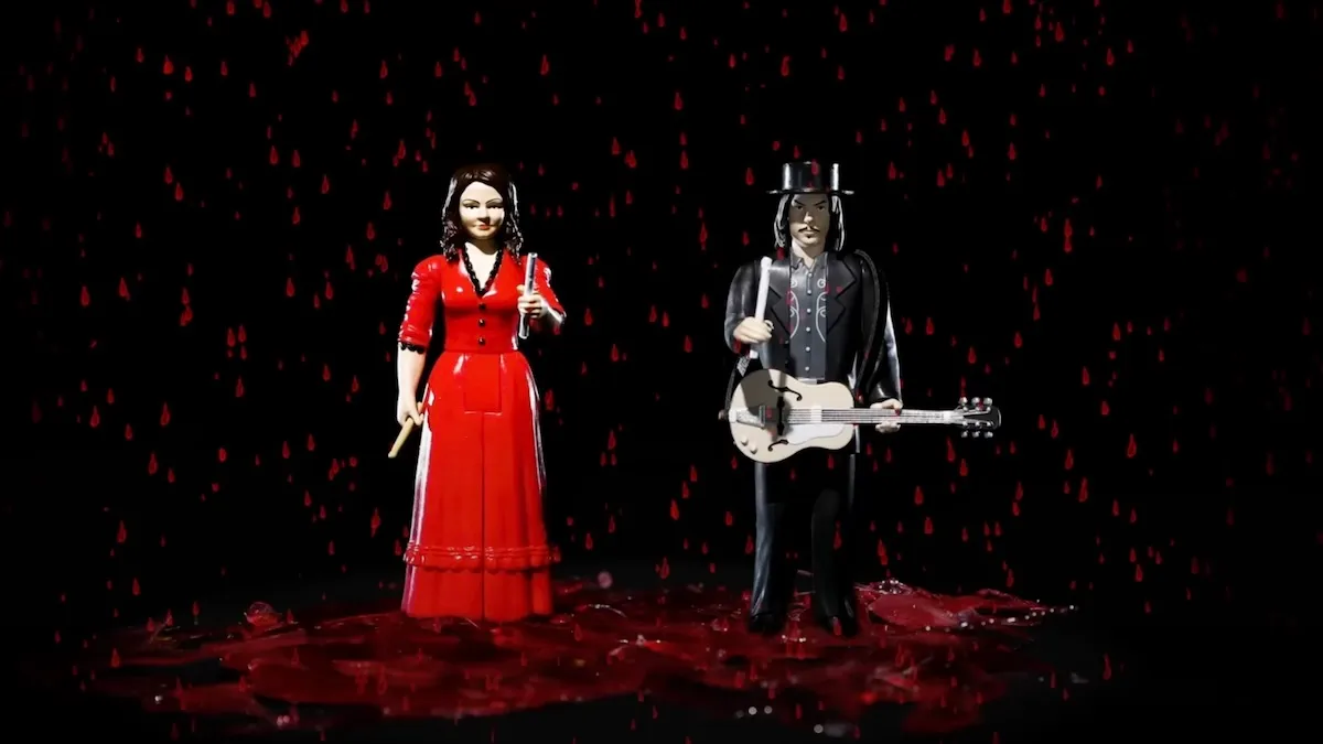 the white stripes celebrate 20 years of get behind me satan with action figures and a surreal video red rain the white stripes mus