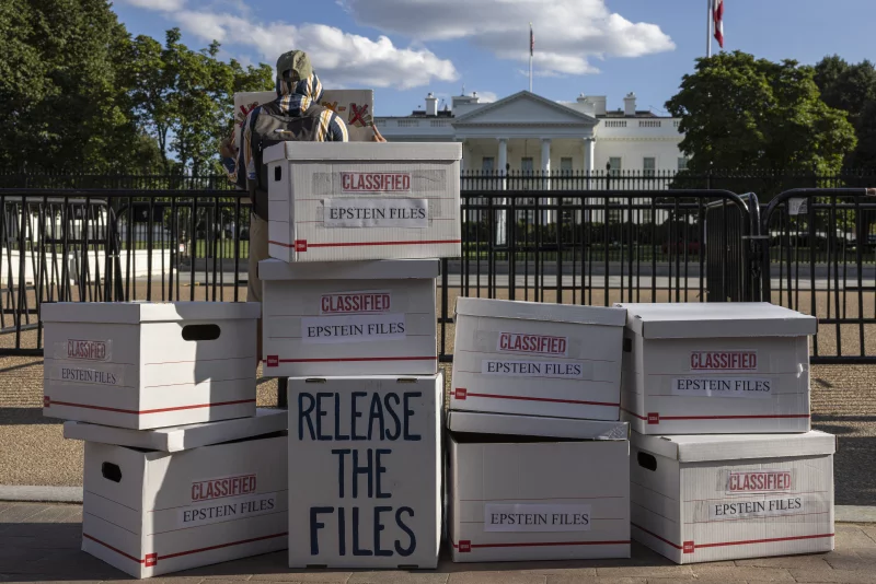 During an anti-Trump protest outside the White House in Washington, D.C., on Sept. 2, demonstrators set up file boxes to represent the Epstein files. On Wednesday, President Trump signed the legislation directing the Department of Justice to release those files.

Mehmet Eser/AFP via Getty Images
